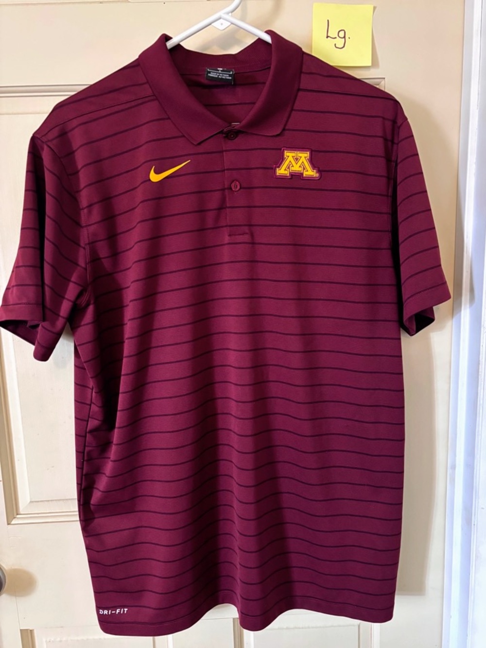 Nike Dri-Fit polo shirt featuring MINNESOTA GOLDEN GOFERS
